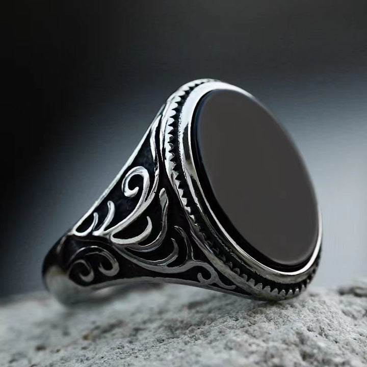 BLACK OVAL AGATE CARVED STAINLESS STEEL RING