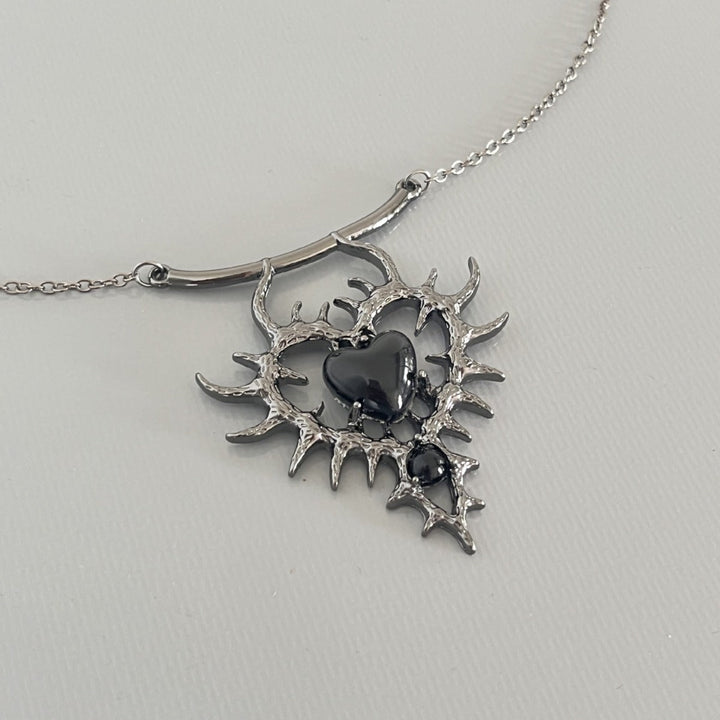 THORN DOUBLE HEART ALLOY PENDANT