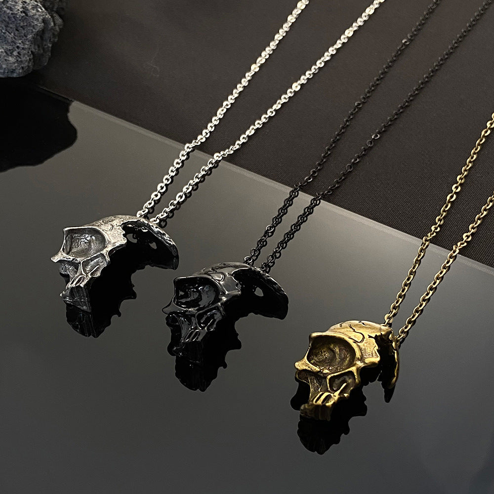 DAMAGED HALF FACE SKULL NECKLACE