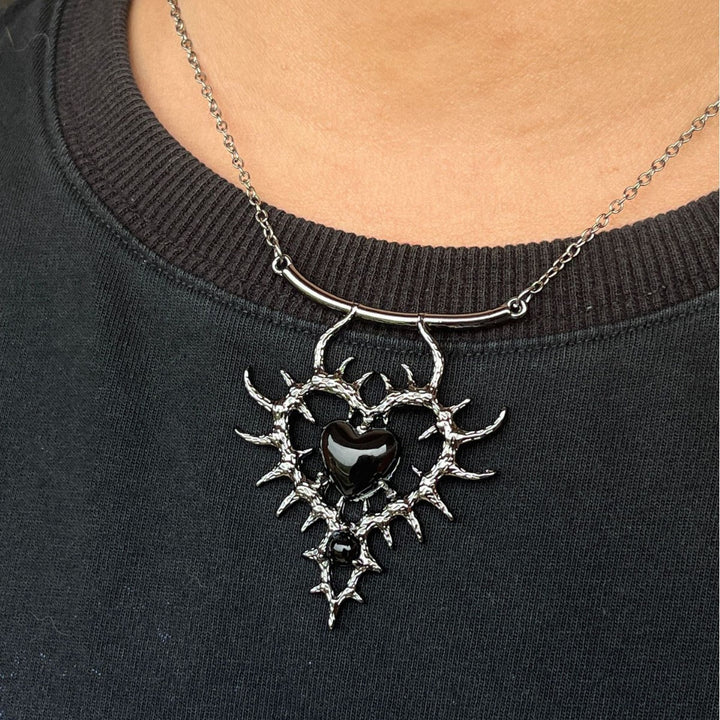 THORN DOUBLE HEART ALLOY PENDANT