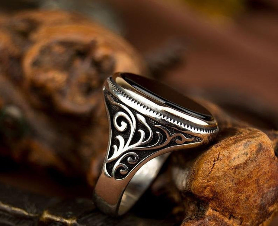 BLACK OVAL AGATE CARVED STAINLESS STEEL RING