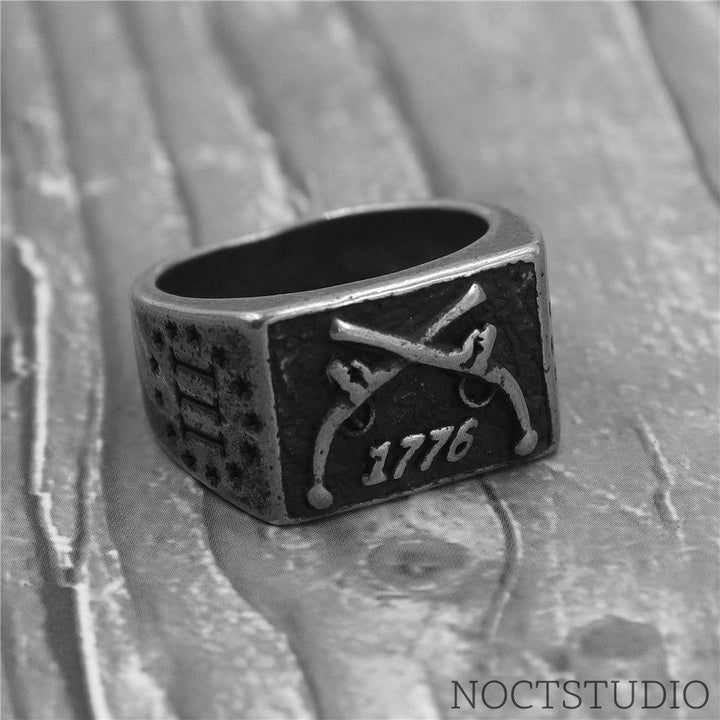 1776 CROSSED GUNS STAINLESS STEEL RING