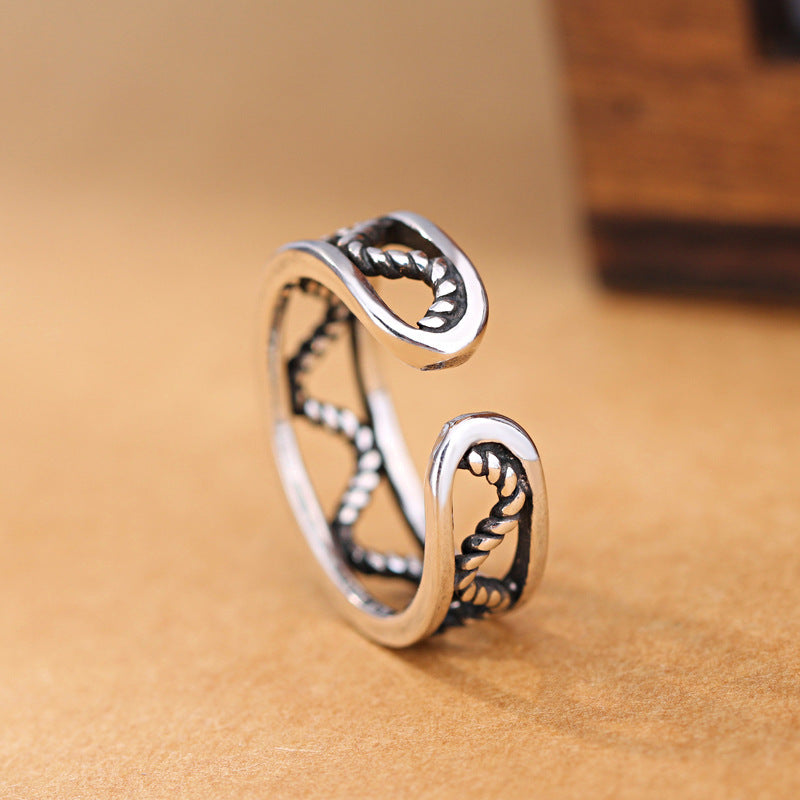 RETRO CREATIVE HOLLOWED-OUT WAVE RING